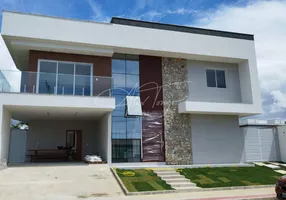 Foto 1 de Casa de Condomínio com 4 Quartos à venda, 276m² em Manguinhos, Serra