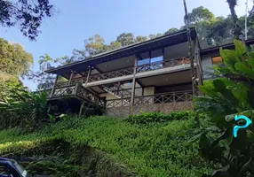 Foto 1 de Casa de Condomínio com 4 Quartos à venda, 400m² em Iporanga, Guarujá