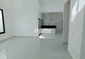 Foto 1 de Casa com 3 Quartos à venda, 163m² em Jardim Holanda, Uberlândia