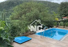 Foto 1 de Casa com 4 Quartos à venda, 360m² em Camboinhas, Niterói