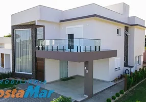 Foto 1 de Casa de Condomínio com 4 Quartos à venda, 250m² em , Tramandaí