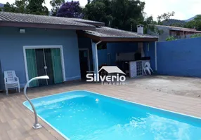Foto 1 de Casa de Condomínio com 2 Quartos à venda, 98m² em Massaguaçu, Caraguatatuba