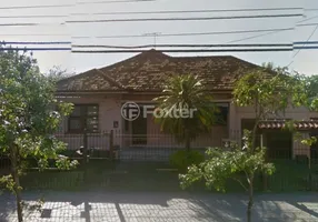Foto 1 de Casa com 4 Quartos à venda, 350m² em Jardim Botânico, Porto Alegre