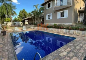 Foto 1 de Casa de Condomínio com 4 Quartos à venda, 400m² em Braúnas, Belo Horizonte