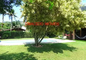 Foto 1 de Casa de Condomínio com 4 Quartos à venda, 310m² em Praia Dura, Ubatuba