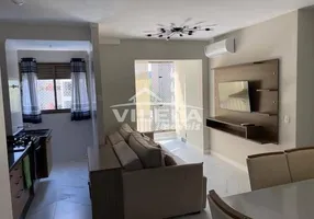 Foto 1 de Apartamento com 2 Quartos para alugar, 60m² em Martim de Sa, Caraguatatuba