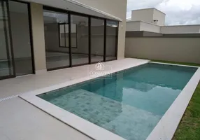 Foto 1 de Casa de Condomínio com 3 Quartos à venda, 313m² em Jardins Gênova, Uberlândia