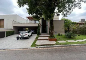 Foto 1 de Casa de Condomínio com 4 Quartos para venda ou aluguel, 676m² em Alphaville, Barueri