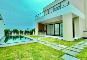Foto 1 de Casa de Condomínio com 4 Quartos à venda, 225m² em Manguinhos, Serra