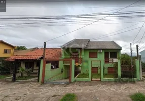 Foto 1 de Casa com 4 Quartos à venda, 205m² em Costa E Silva, Porto Alegre