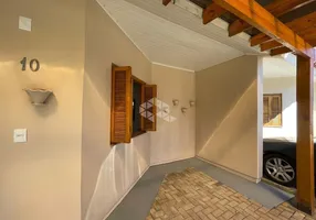 Foto 1 de Casa de Condomínio com 2 Quartos à venda, 53m² em Neopolis, Gravataí