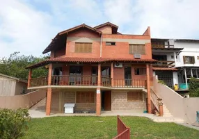 Foto 1 de Casa com 3 Quartos à venda, 429m² em Vila Nova, Porto Alegre
