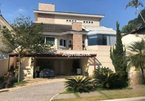 Foto 1 de Casa de Condomínio com 4 Quartos à venda, 450m² em Alphaville, Barueri
