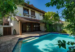 Foto 1 de Casa de Condomínio com 4 Quartos à venda, 368m² em Boa Vista, Porto Alegre