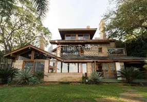 Foto 1 de Casa com 3 Quartos para alugar, 354m² em Pedra Redonda, Porto Alegre