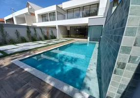 Foto 1 de Casa de Condomínio com 4 Quartos à venda, 350m² em Barra da Tijuca, Rio de Janeiro