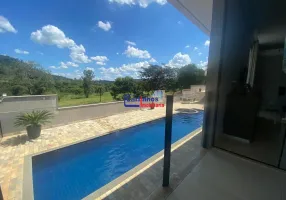 Foto 1 de Casa de Condomínio com 4 Quartos à venda, 430m² em Granja Gloria, Itaúna