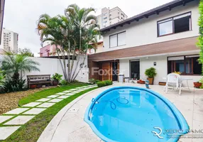 Foto 1 de Casa com 5 Quartos à venda, 454m² em Jardim Botânico, Porto Alegre