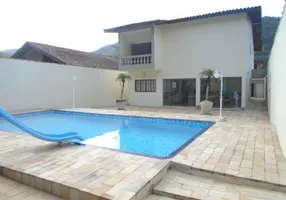 Foto 1 de Casa com 4 Quartos à venda, 240m² em Jardim Guaiúba, Guarujá