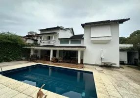 Foto 1 de Casa de Condomínio com 3 Quartos para venda ou aluguel, 570m² em Barra da Tijuca, Rio de Janeiro