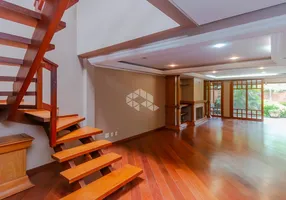 Foto 1 de Casa de Condomínio com 4 Quartos à venda, 392m² em Três Figueiras, Porto Alegre