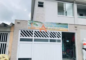 Foto 1 de Casa com 2 Quartos à venda, 75m² em Vila Tupi, Praia Grande