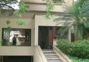 Foto 1 de Casa de Condomínio com 4 Quartos à venda, 384m² em Menino Deus, Porto Alegre