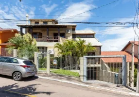 Foto 1 de Casa de Condomínio com 4 Quartos à venda, 426m² em Nonoai, Porto Alegre