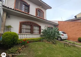 Foto 1 de Casa com 4 Quartos à venda, 243m² em Cavalhada, Porto Alegre