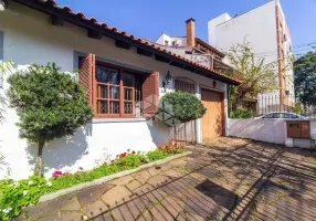 Foto 1 de Casa com 4 Quartos à venda, 180m² em Jardim Botânico, Porto Alegre