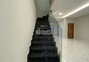 Foto 1 de Casa com 3 Quartos à venda, 135m² em Jardim Europa, Uberlândia