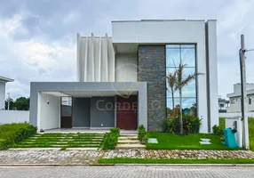 Foto 1 de Casa de Condomínio com 4 Quartos à venda, 250m² em Jacunda, Aquiraz