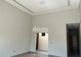 Foto 1 de Casa com 3 Quartos à venda, 114m² em Novo Mundo, Uberlândia