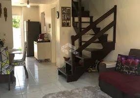Foto 1 de Casa de Condomínio com 2 Quartos à venda, 96m² em Vila Nova, Porto Alegre