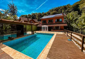 Foto 1 de Casa de Condomínio com 4 Quartos à venda, 350m² em Granja Comary, Teresópolis