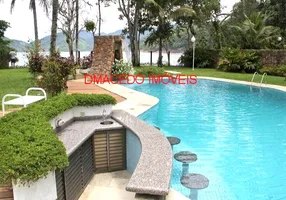 Foto 1 de Casa de Condomínio com 5 Quartos para alugar, 730m² em Praia Domingas Dias, Ubatuba