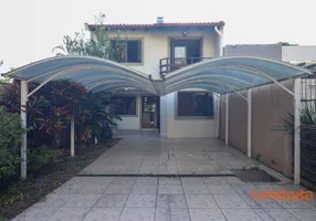 Foto 1 de Casa com 4 Quartos para alugar, 245m² em Cavalhada, Porto Alegre