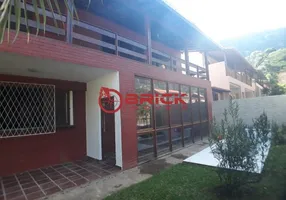 Foto 1 de Casa de Condomínio com 5 Quartos para venda ou aluguel, 350m² em Carlos Guinle, Teresópolis