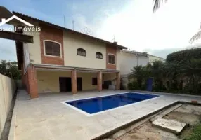 Foto 1 de Casa de Condomínio com 4 Quartos à venda, 320m² em Jardim Acapulco , Guarujá