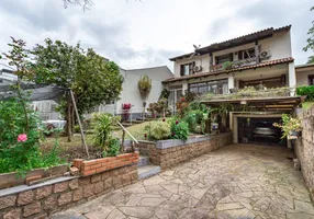 Foto 1 de Casa com 4 Quartos à venda, 211m² em Jardim do Salso, Porto Alegre