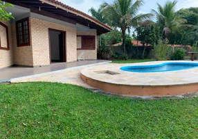 Foto 1 de Casa com 6 Quartos à venda, 370m² em Armação, Florianópolis