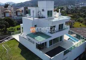 Foto 1 de Casa com 5 Quartos à venda, 900m² em Cacupé, Florianópolis