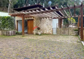 Foto 1 de Casa de Condomínio com 5 Quartos à venda, 273m² em Vale Encantado, Campos do Jordão