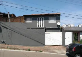 Foto 1 de Casa com 4 Quartos à venda, 90m² em Jardim Europa, Porto Alegre