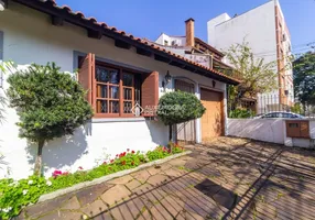 Foto 1 de Casa com 4 Quartos à venda, 180m² em Jardim Botânico, Porto Alegre