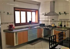 Foto 1 de Casa de Condomínio com 4 Quartos à venda, 298m² em Fazenda Rincao, Arujá