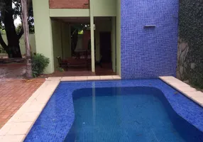 Foto 1 de Casa com 4 Quartos para venda ou aluguel, 400m² em Jardim Shangri La, Cuiabá