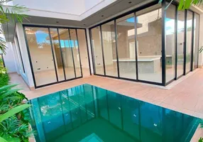 Foto 1 de Casa de Condomínio com 4 Quartos à venda, 220m² em Granja Marileusa , Uberlândia