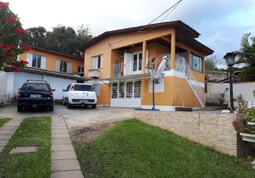 Foto 1 de Casa com 4 Quartos à venda, 274m² em Vila Nova, Porto Alegre