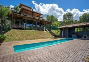 Foto 1 de Casa de Condomínio com 6 Quartos à venda, 587m² em Passárgada, Nova Lima